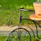 Glitzhome® 24" Black Metal Tricycle Planter Stand with Solid Wood Tray